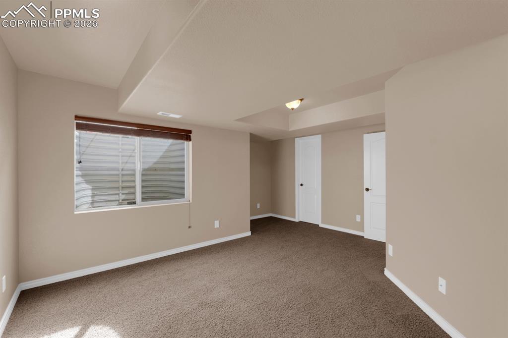 Image 26 of 33: Basement bedroom
