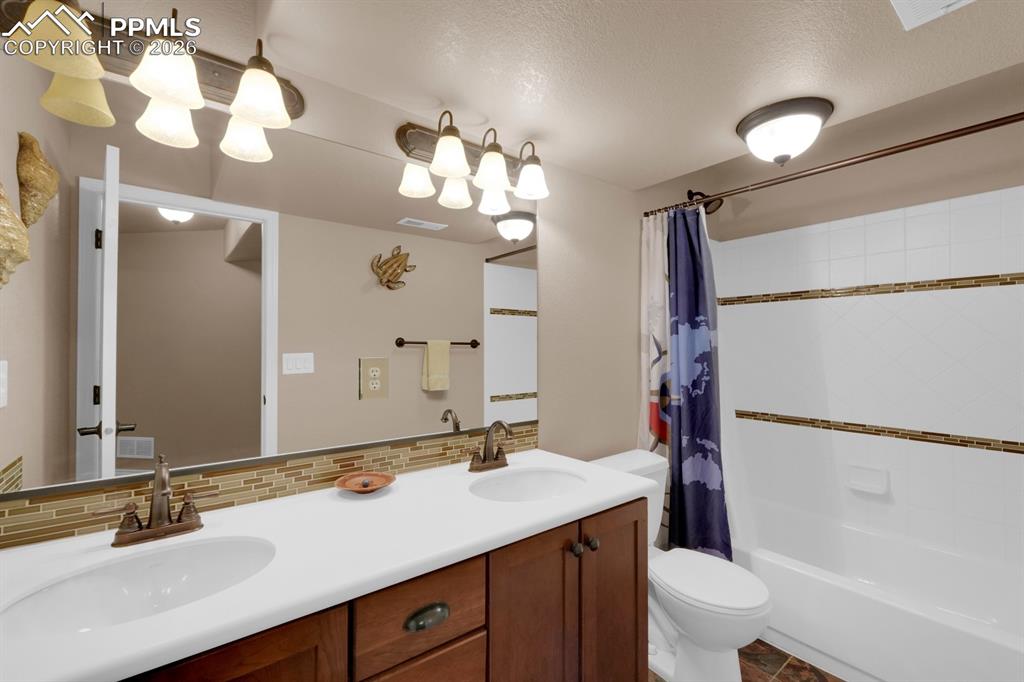 Image 27 of 33: Basement bathroom