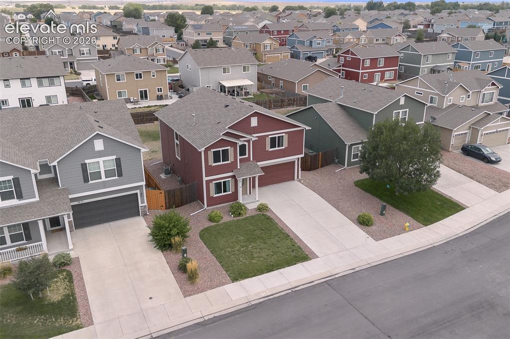 Image 2 of 37: Aerial view of home and front yard