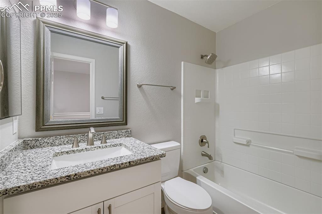 Image 16 of 22: Full bathroom featuring tub / shower combination on upper level