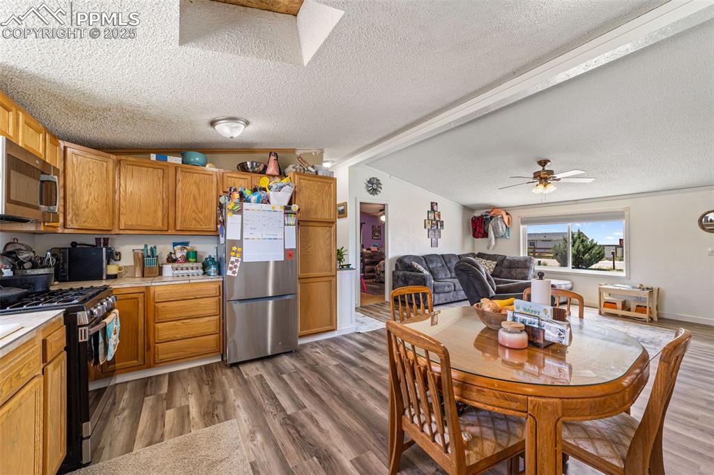 Image 7 of 39: Kitchen &Living Room