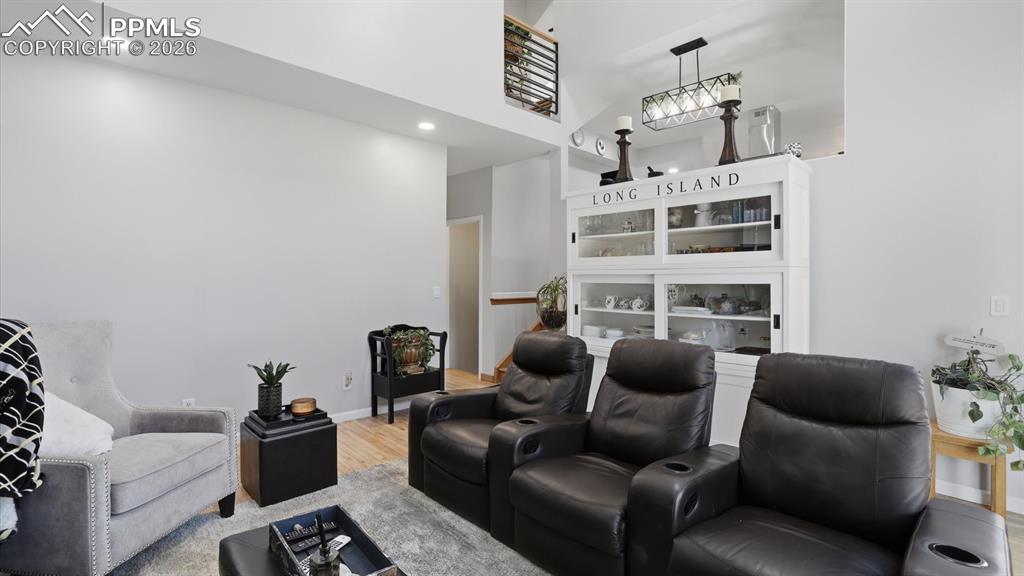 Image 19 of 50: Lower Level Family Room with mounted TV that stays.