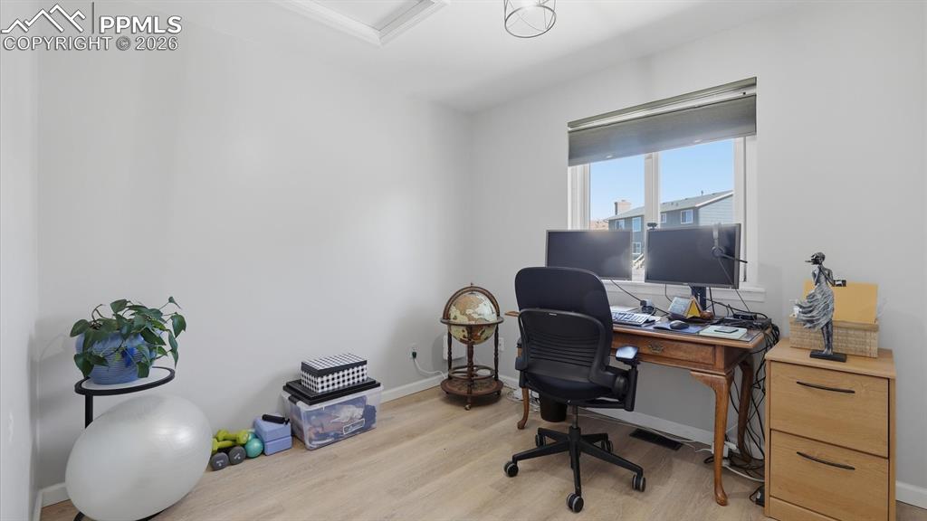 Image 30 of 50: Upper Level Bedroom #2 has LVP flooring.