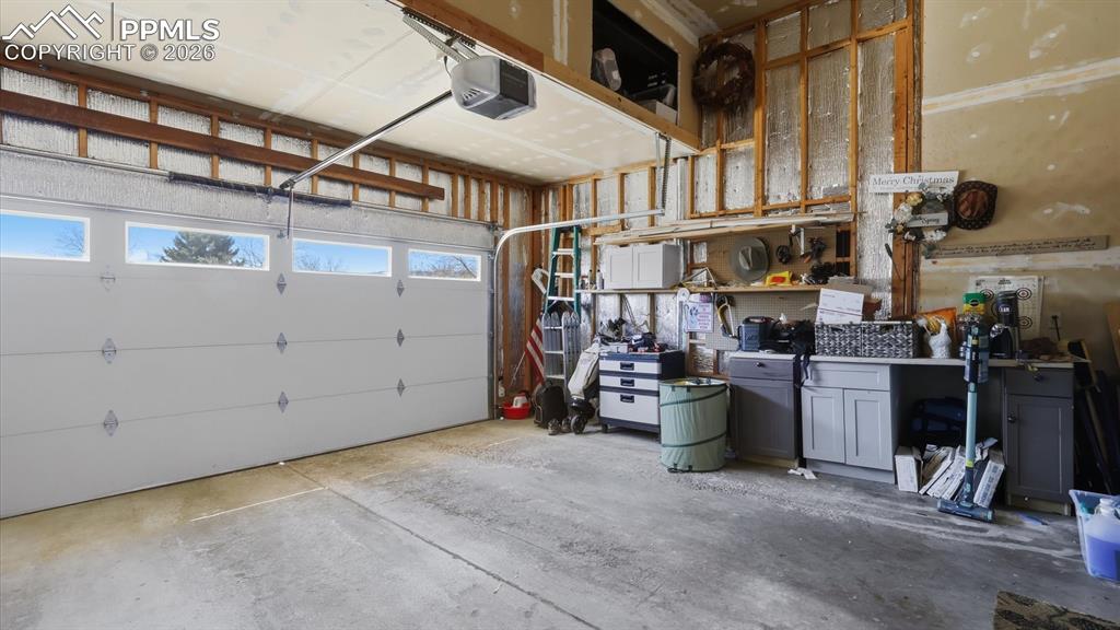 Image 42 of 50: Laundry hookups are available in the garage and in the basement. Washer and