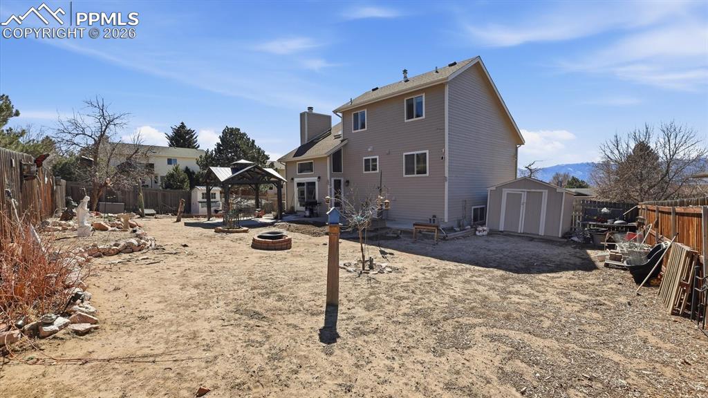 Image 44 of 50: 2-car attached garage with storage.