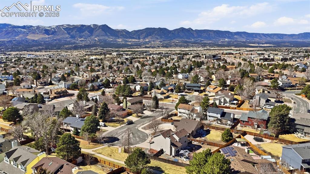 Image 49 of 50: Enjoy the Colorado sunshine and fresh air from the backyard patio and gazeb