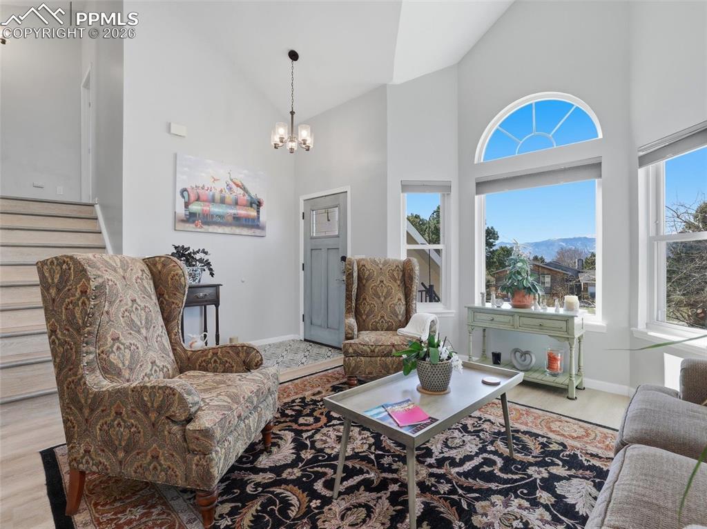 Image 6 of 50: Great curb appeal with rock gardens and raised stone planters.
