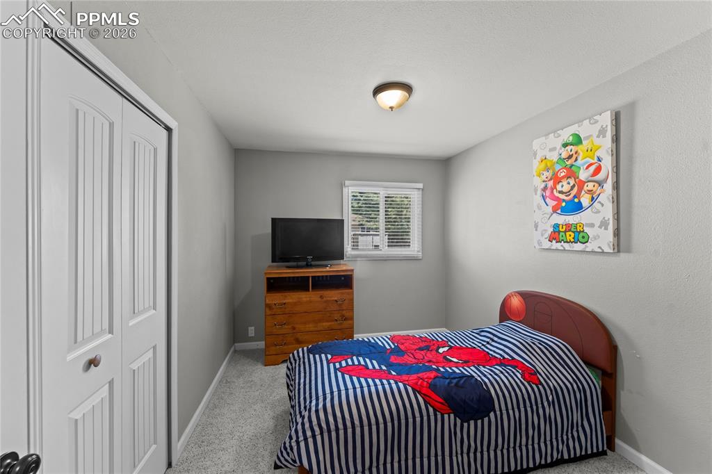 Image 18 of 28: Bedroom
