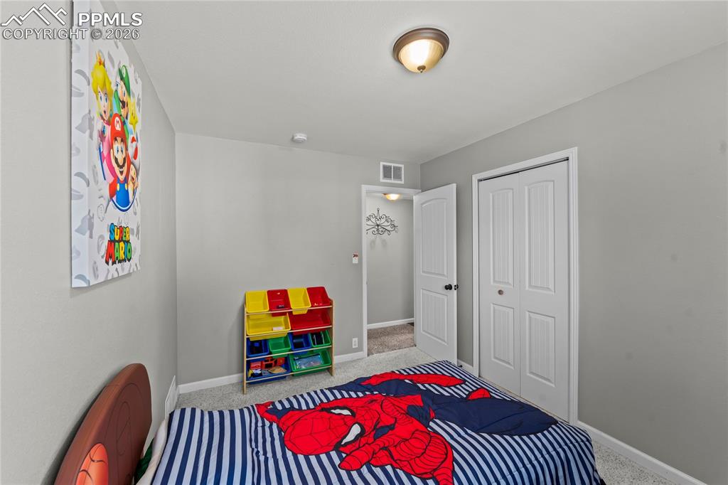 Image 19 of 28: Bedroom