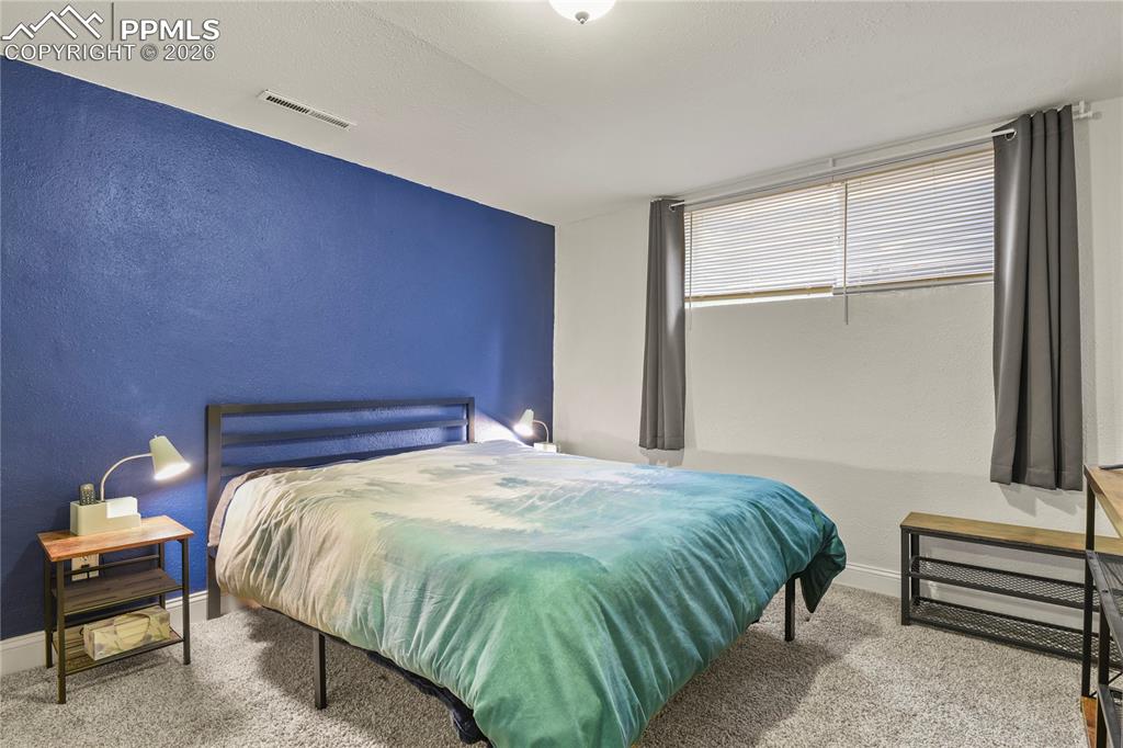 Image 24 of 36: Bedroom