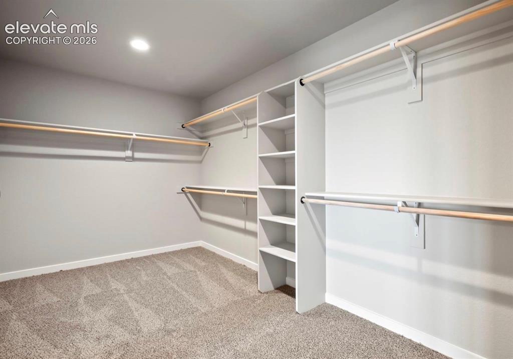 Image 17 of 25: Primary Walk-in Closet