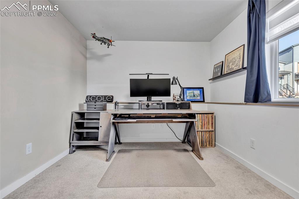 Image 24 of 39: Bonus room - walk in closet, garden level, carpeted