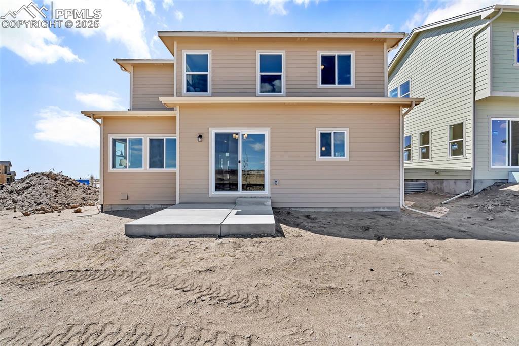 Image 40 of 46: Back of house featuring a patio
