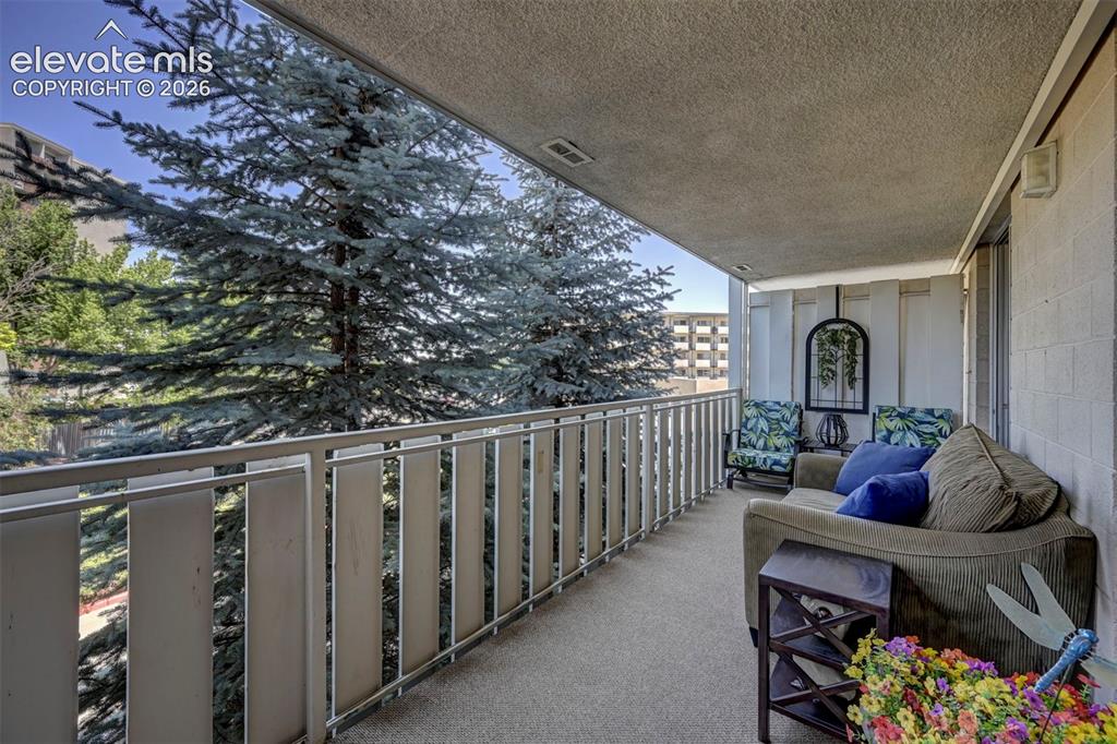 Image 11 of 33: Private Balcony Oasis+ added living space!