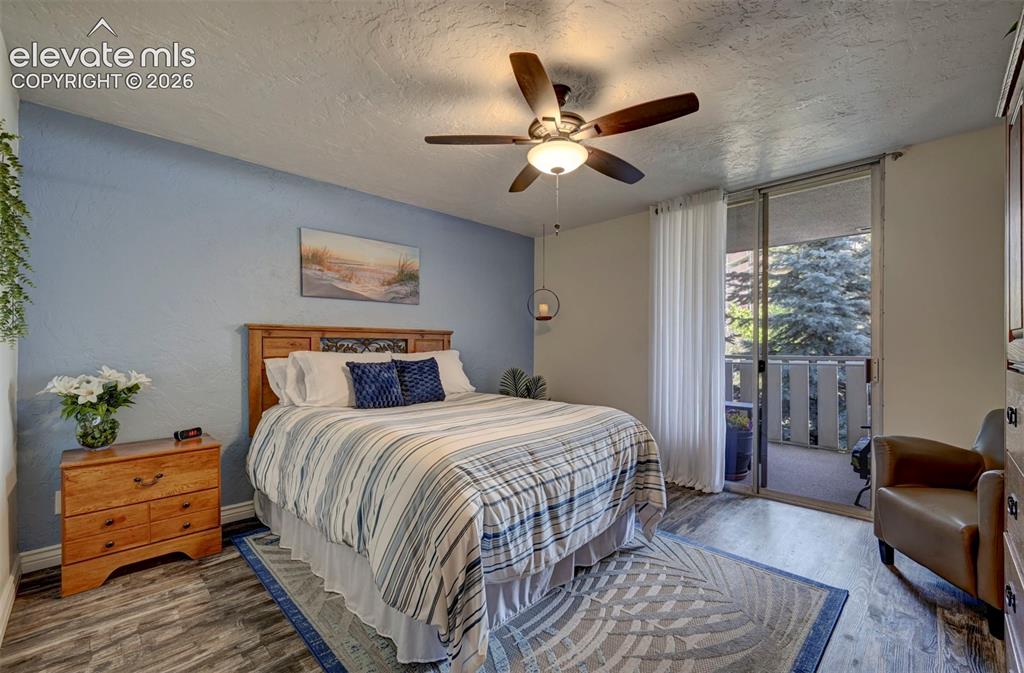 Image 15 of 33: Spacious Bedroom w/ Balcony walk-out!