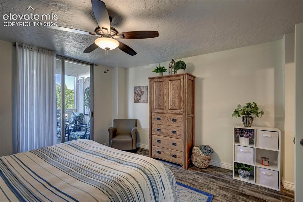 Image 16 of 33: Spacious Bedroom w/ Balcony walk-out!