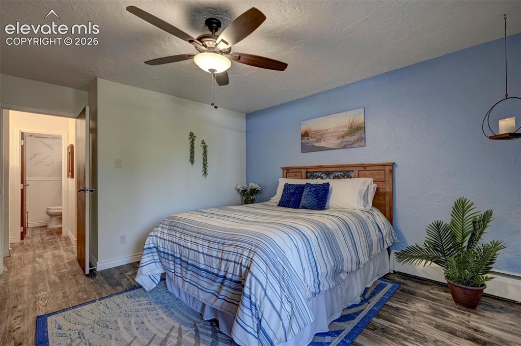 Image 17 of 33: Hallway to bathroom & closets/ storage