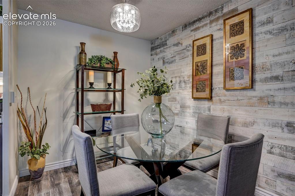 Image 8 of 33: Stylishly updated w/ Reclaimed Wood Wall