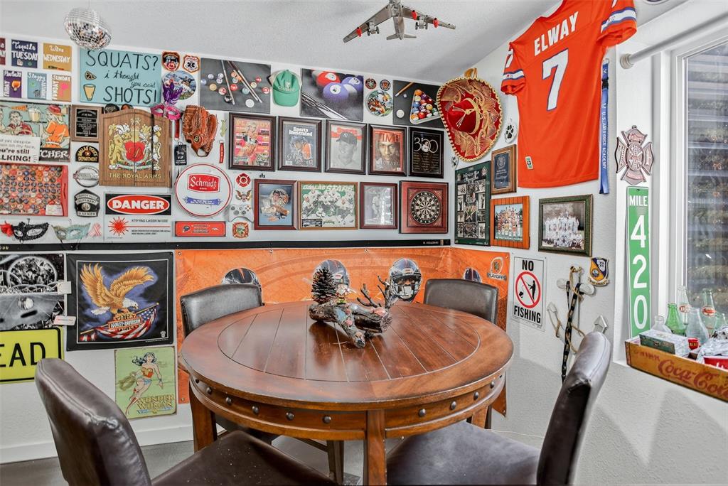 Image 34 of 42: The finished lower level adds exceptional versatility—perfect for a rec roo