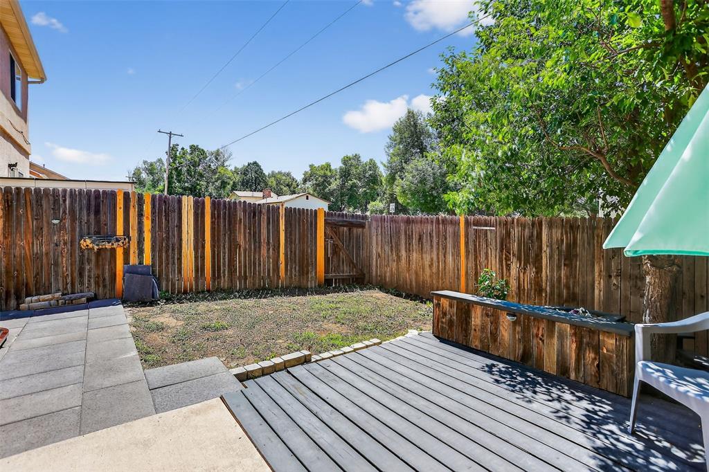 Image 41 of 42: Relax and take in peaceful Colorado evenings from the private, fenced backy