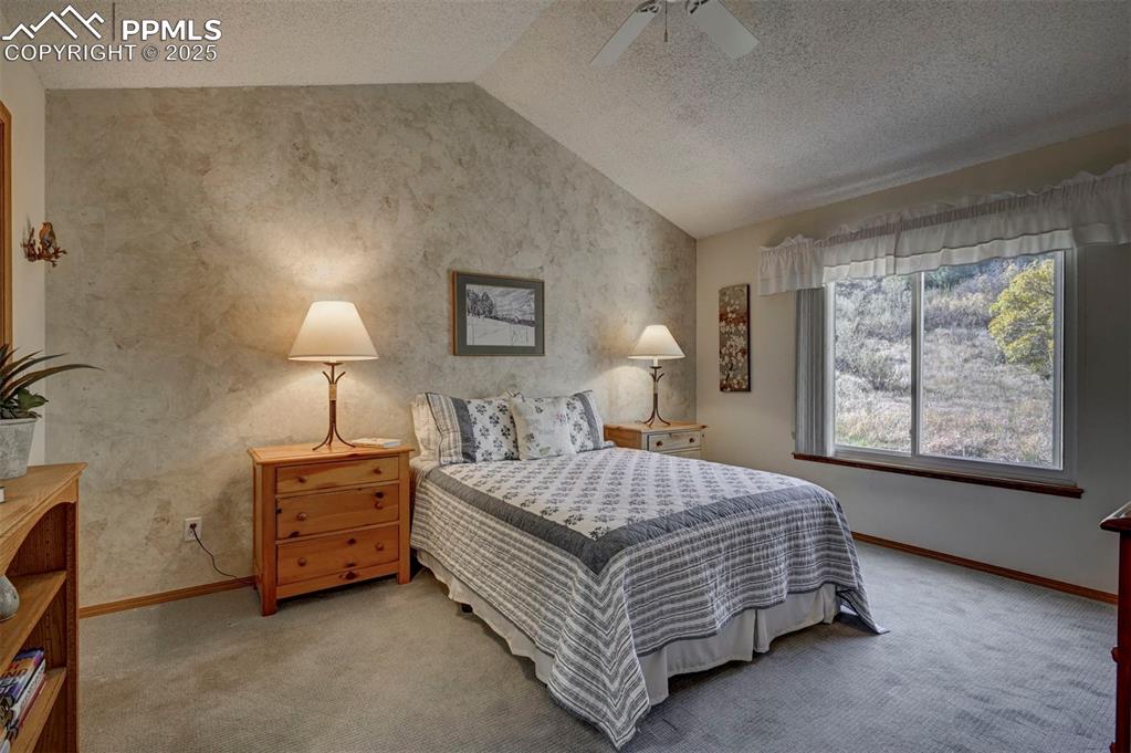 Image 21 of 43: Spacious Upper Level Primary Suite w/Views of the Open Space