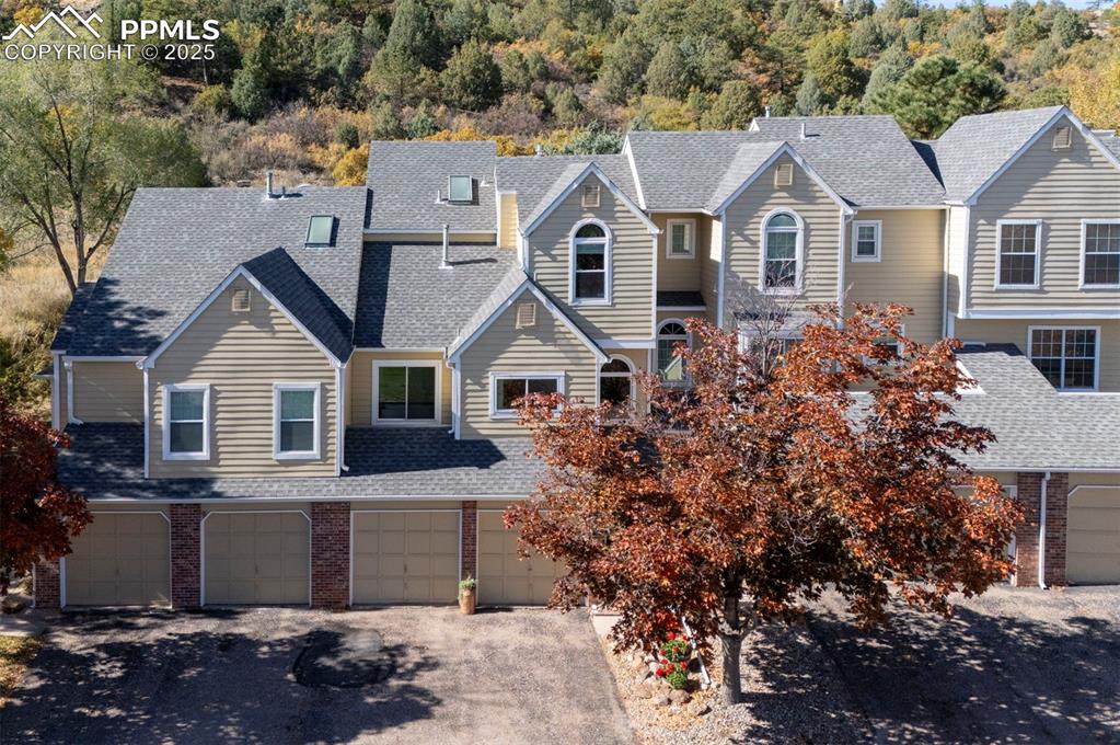 Image 34 of 43: 2 Car Garage & Front Entrance