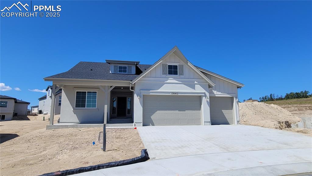 Caption: Brentford-Ranch Plan-Farmhouse Elevation-3 Car Garage-Finished Basement with 9