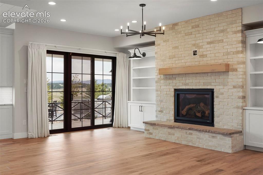 Image 11 of 49: The living room and dining area combine to make a great room feel. The gas