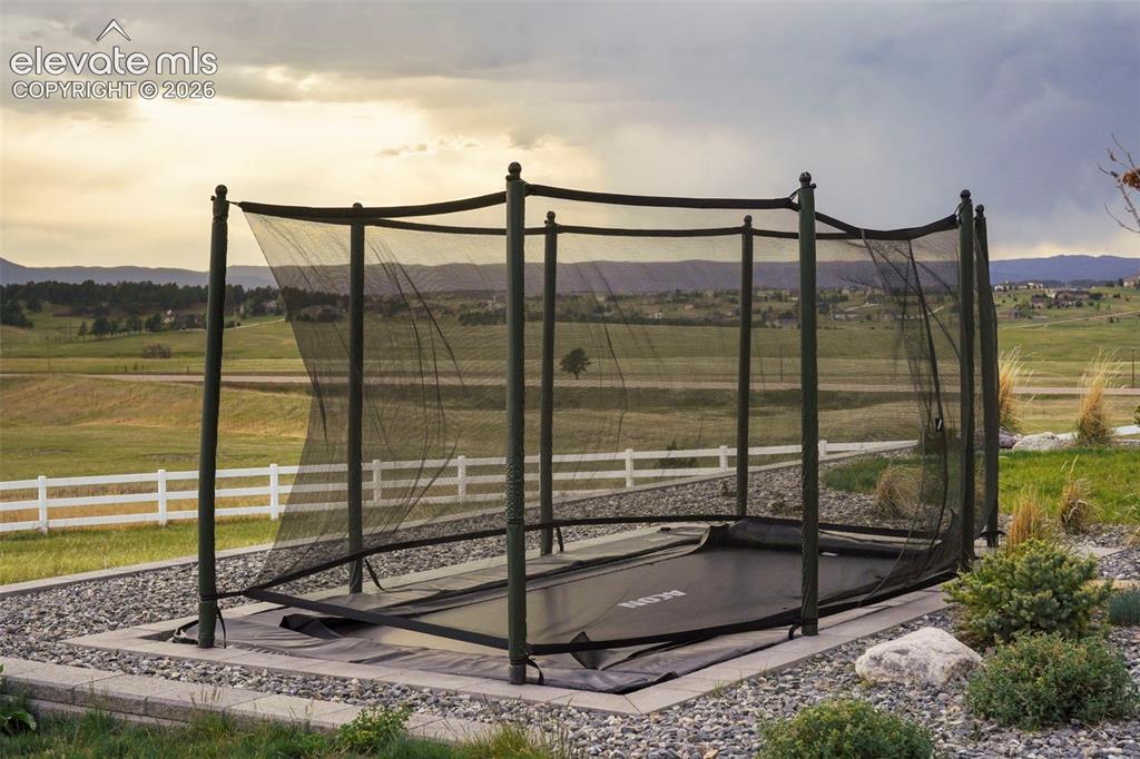 Image 46 of 49: Detached garage RV bay is great for keeping your toys out of the weather.