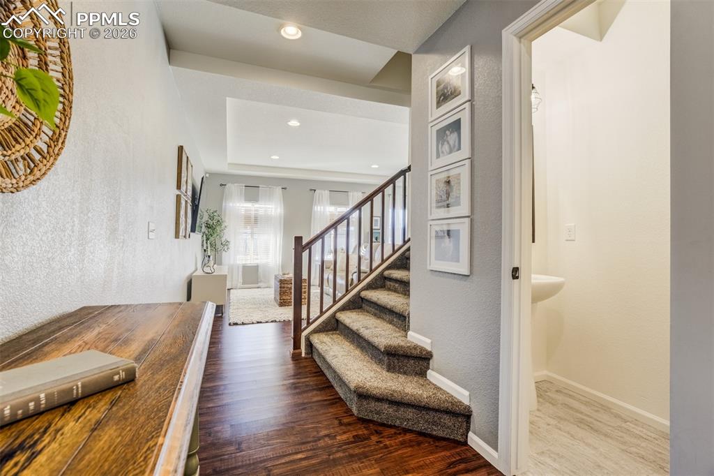Image 11 of 42: Stairs lead to upper level that has 3 bedrooms. 