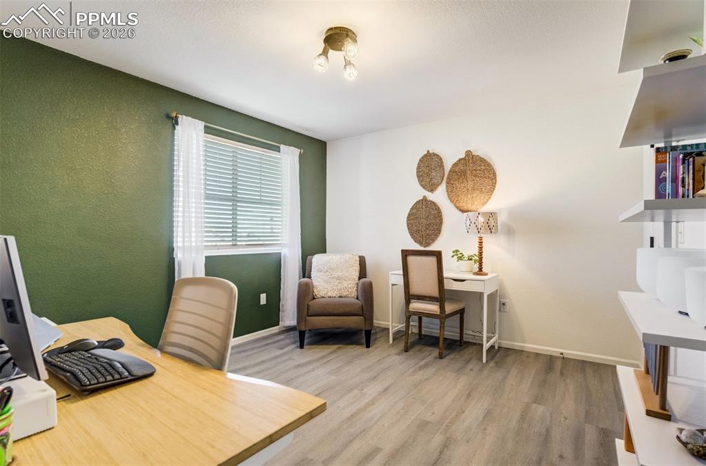 Image 23 of 42: Bedroom 3 is currently being used as an office. 