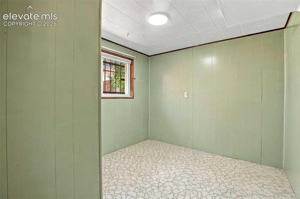 Image 26 of 42: Basement Bedroom