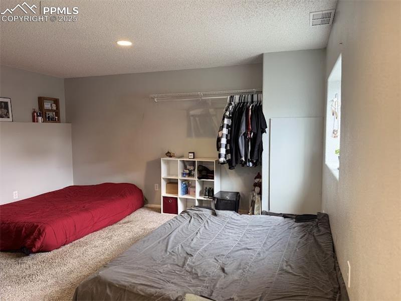 Image 13 of 21: Bedroom