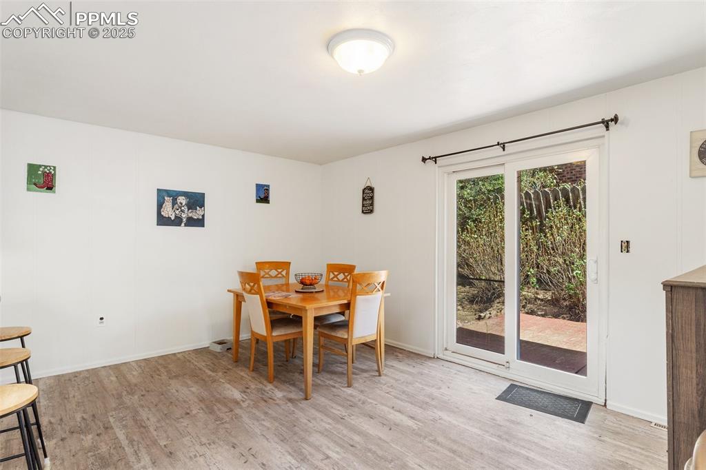 Image 5 of 14: Most of main level is luxury vinyl plank floors