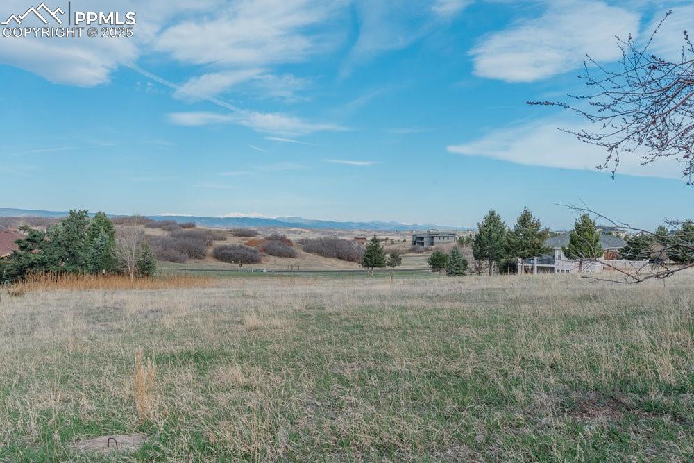 Image 44 of 44: View of yard with a view of countryside
