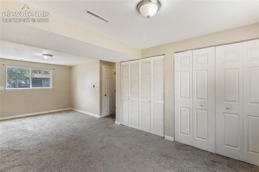 Image 13 of 23: Large family room with versatile layout