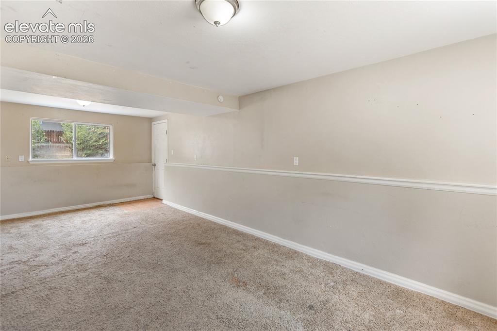 Image 14 of 23: Additional view of the lower-level family room
