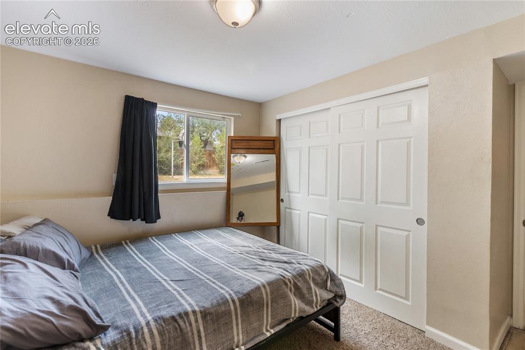 Image 8 of 23: Comfortable bedroom with generous closet space