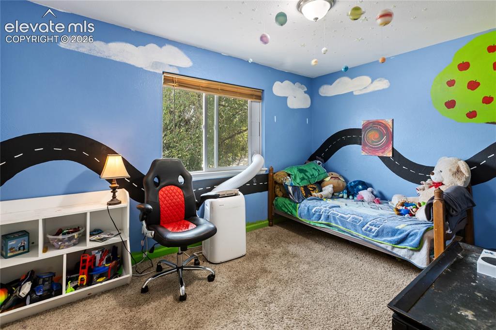 Image 9 of 23: Bedroom with playful accent walls