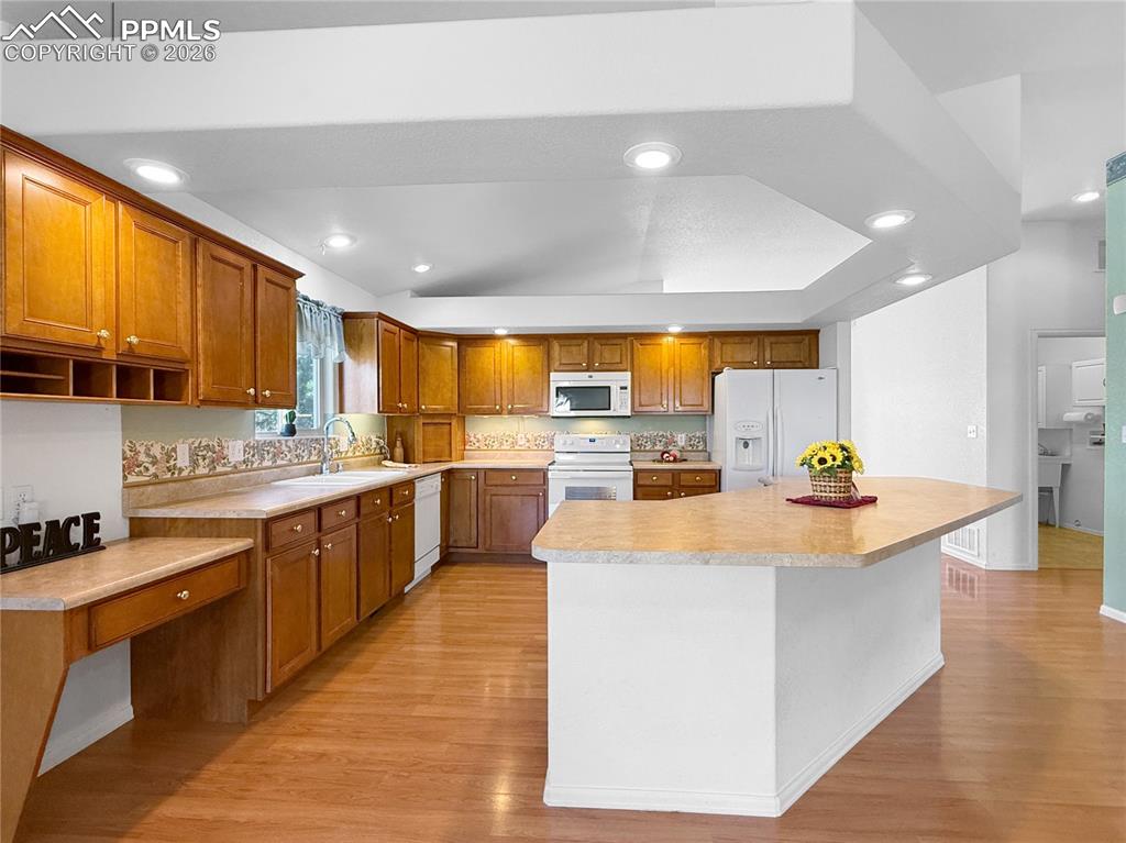 Image 15 of 46: Desk built in to catch all that mail. lol