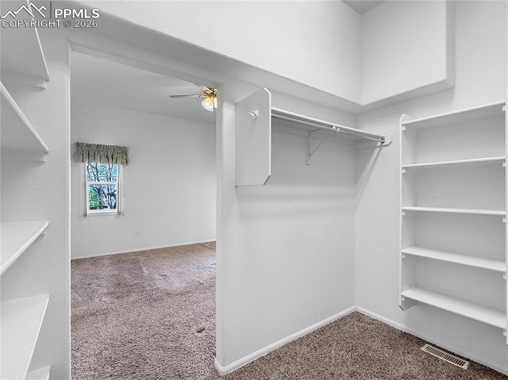 Image 20 of 46: Huge walk-in closet