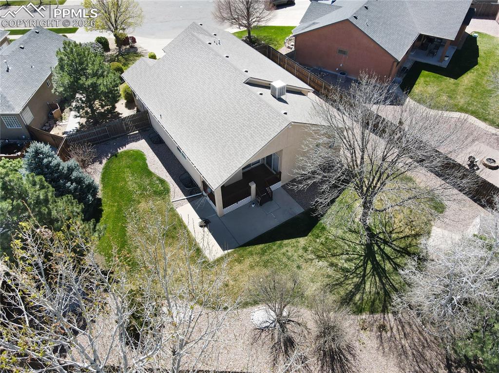 Image 43 of 46: Aerial view of the back yard.