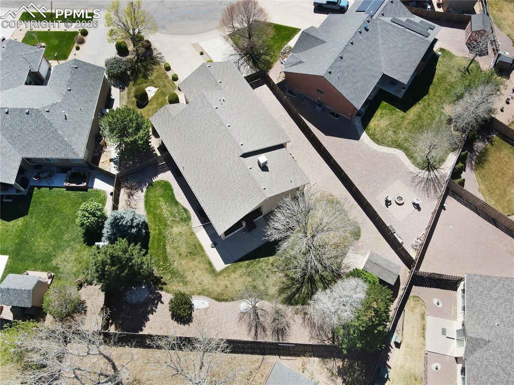 Image 46 of 46: Notice the shed by the back fence, for outdoor storage.