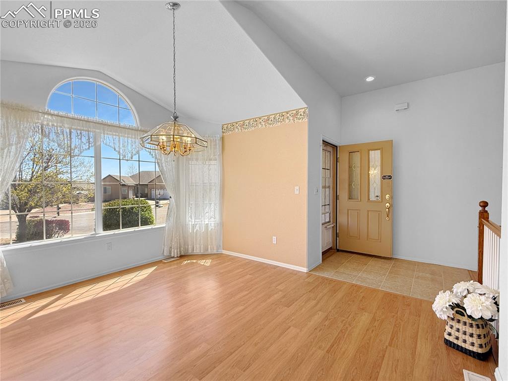 Image 9 of 46: Ample space in the front dining/living area.