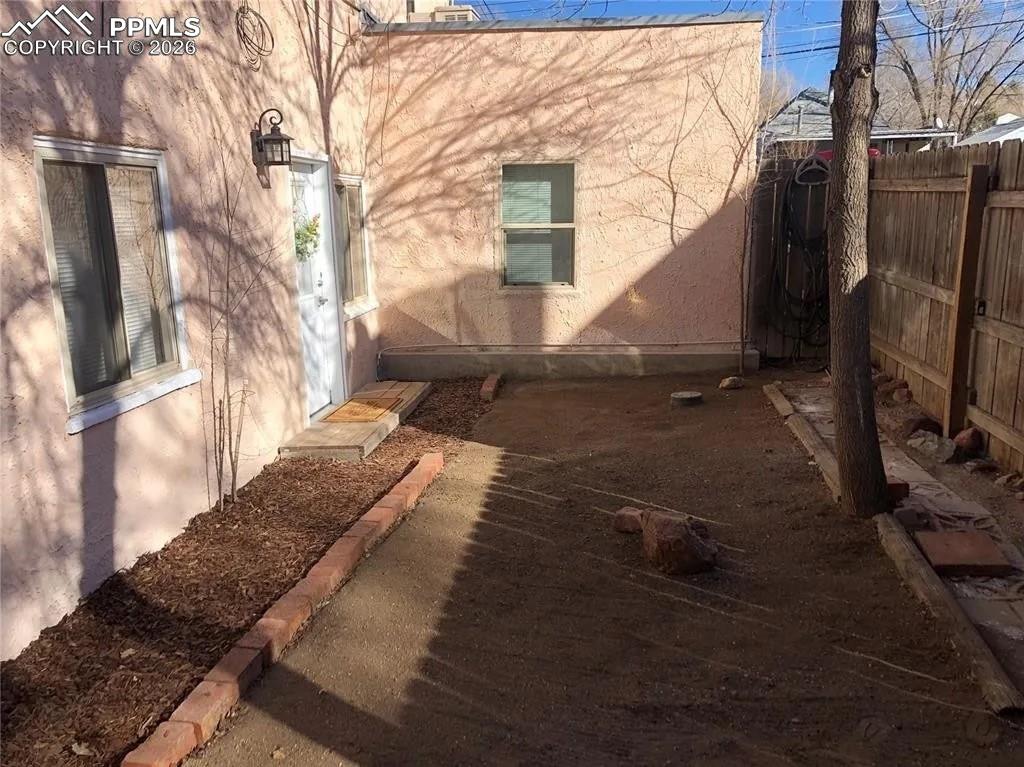 Image 16 of 33: Unit 2 Side Yard