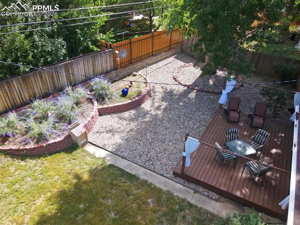 Image 32 of 49: Fully landscaped backyard