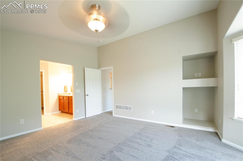 Image 16 of 50: Master Bedroom