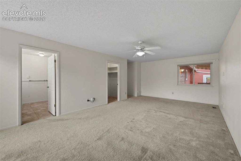 Image 11 of 40: Primary bedroom suite
