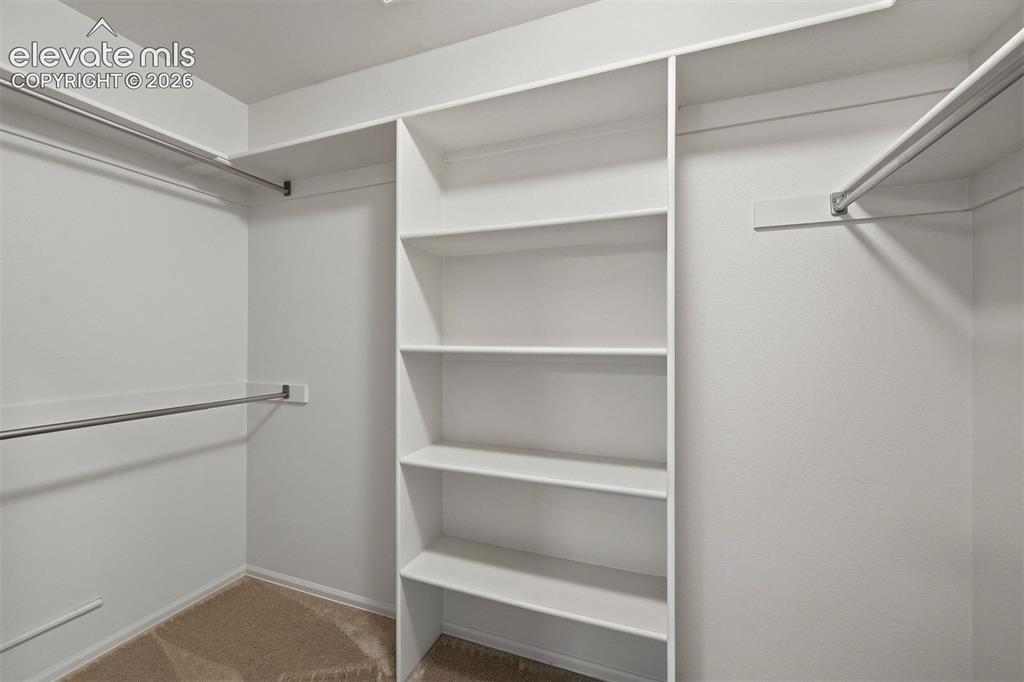 Image 23 of 40: Main level walk-in closet