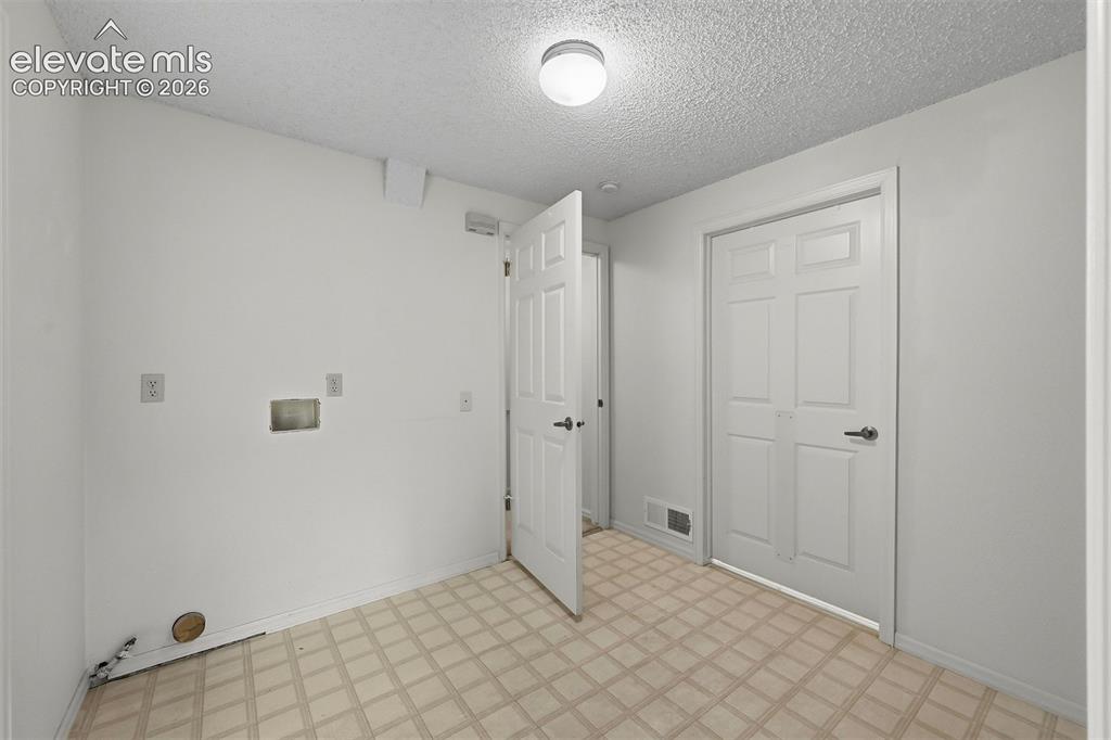 Image 29 of 40: Basement Laundry area